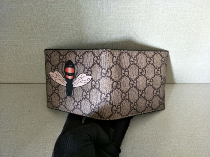 G*u*i with plaid bee wallet